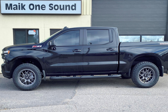 2021 RAM 1500 with professional window tint in North Bay